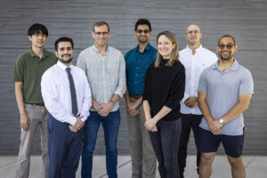 The team working on the ADD-H2 project pose together outside of a facility on the APL campus. Team member names are listed in the text below the image.